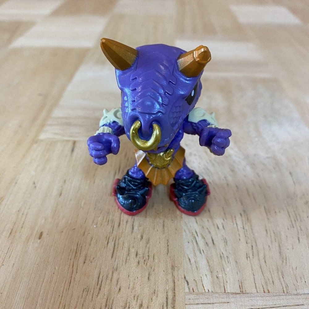 Moose Toys Treasure X Figure Dragon Dino Demon Purple Orange Horns Nose Ring